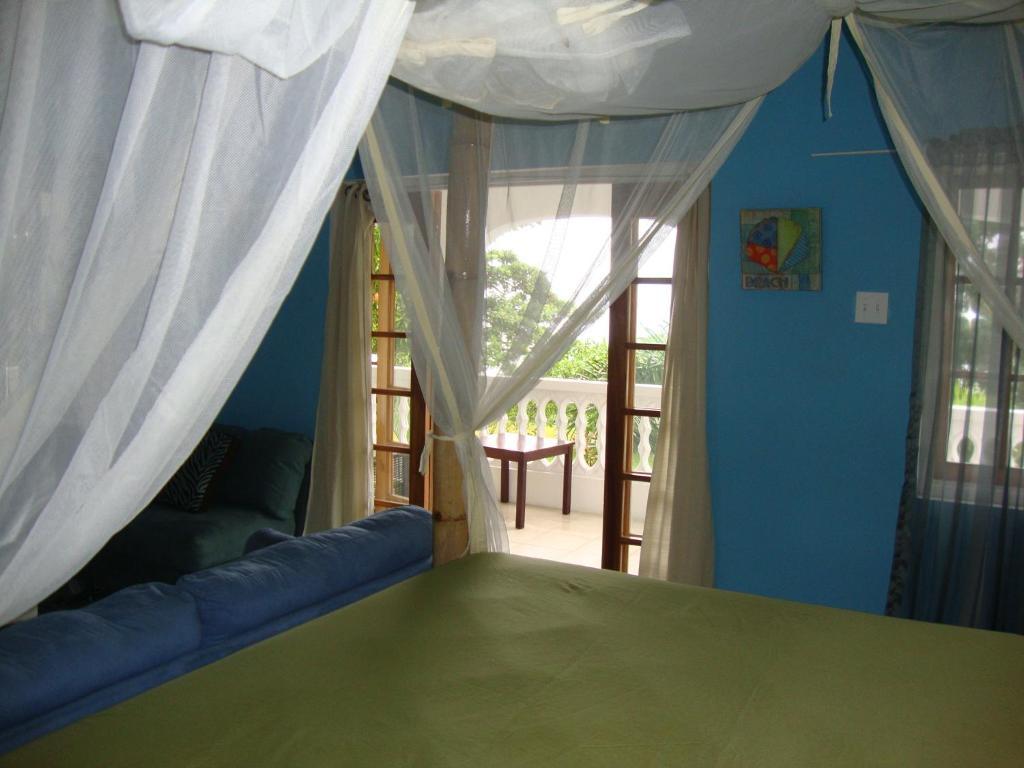 By The Sea Vacation Home And Villa بورت أنطونيو الغرفة الصورة